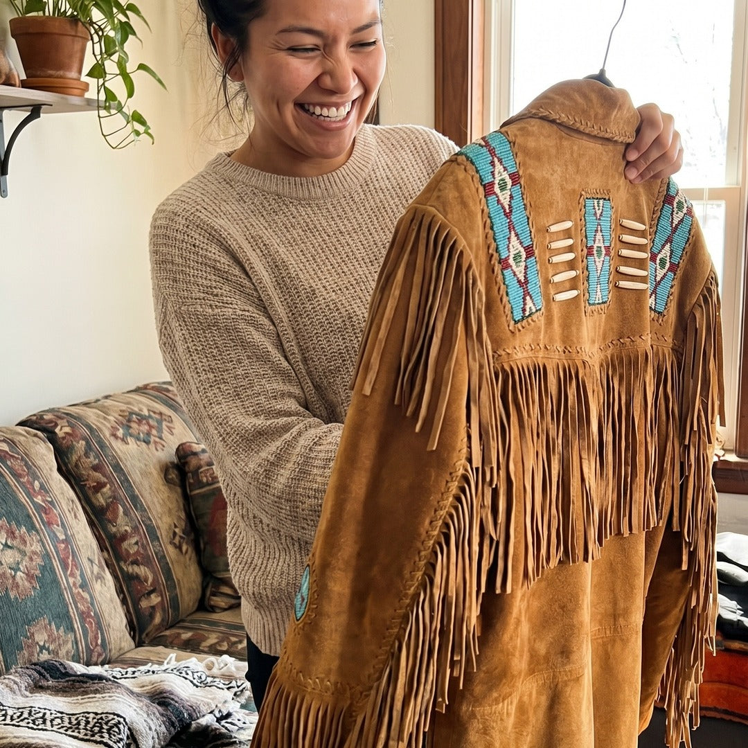 Customer holding her new fringe jacket