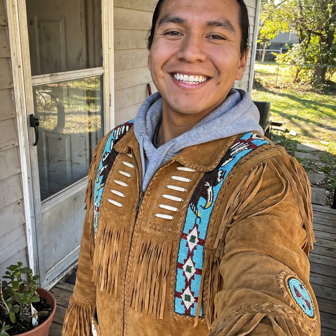 Customer wearing the fringe jacket on his porch
